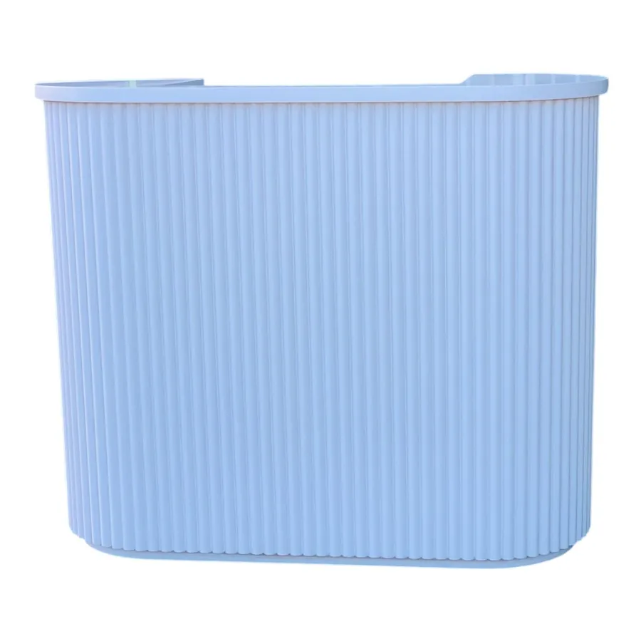 Fluted racetrack reception counter finished in powder blue