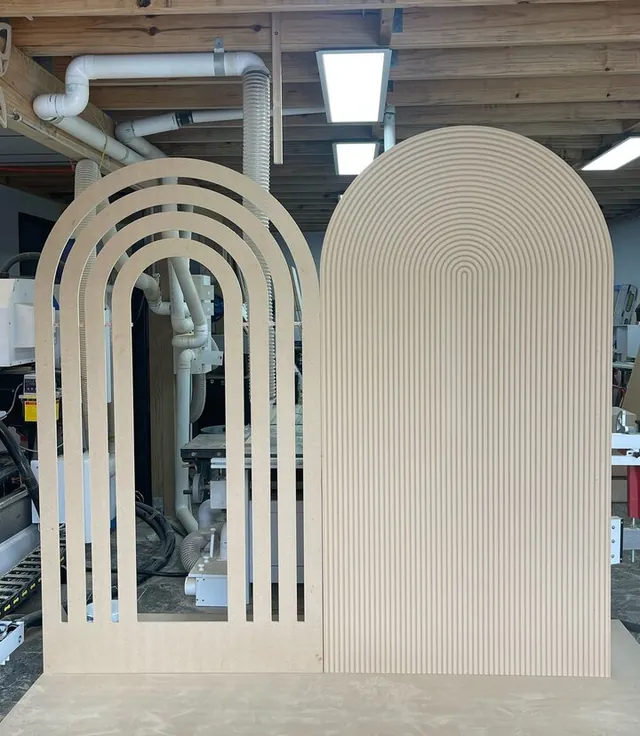 Nested open arch frames in the workshop before finishing