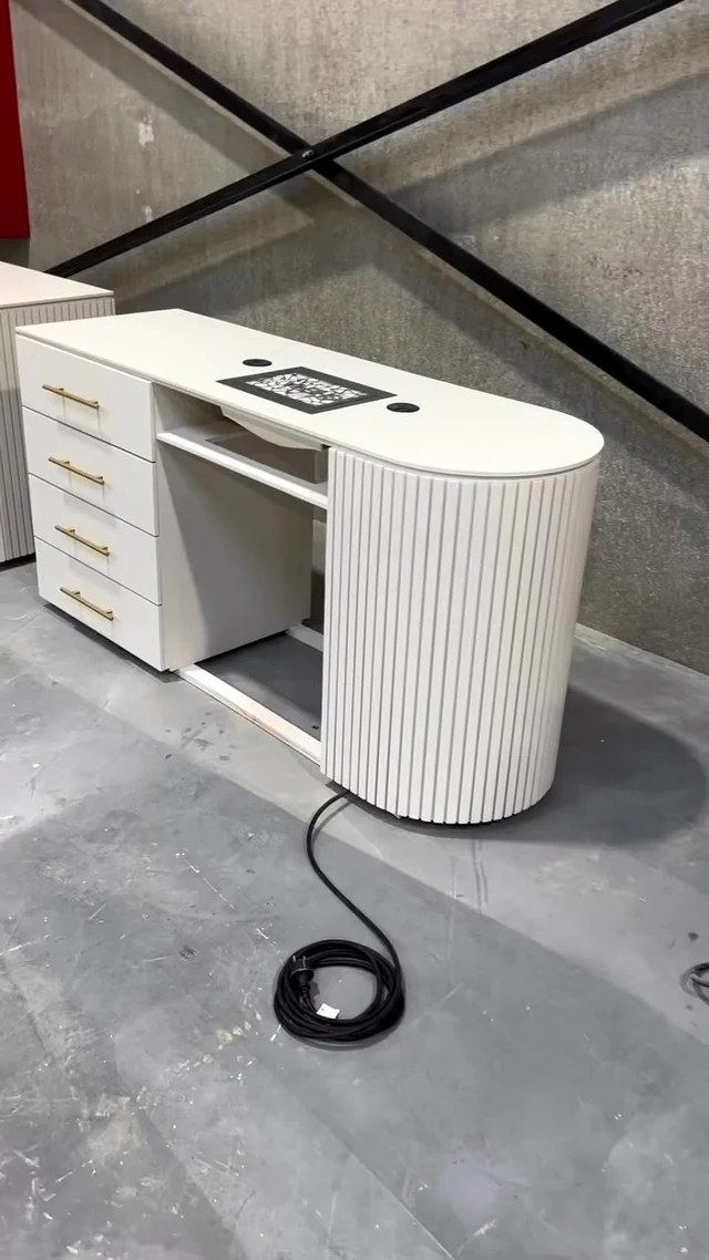 White fluted office desk with a drawer bank
