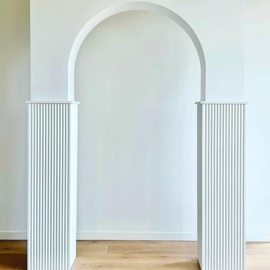 Three-piece hollow arch set in white, nested one inside the other