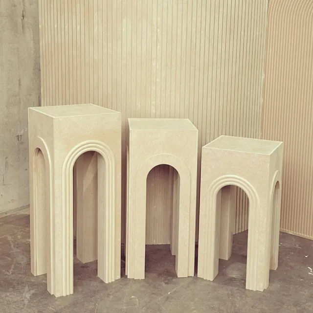 A run of arch-front plinths in graduated heights